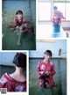 A woman in a red kimono is sitting in the water.